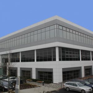 Extensive use of aluminium panels with new powder coated colours has brought this 35 year old building to modern standards.